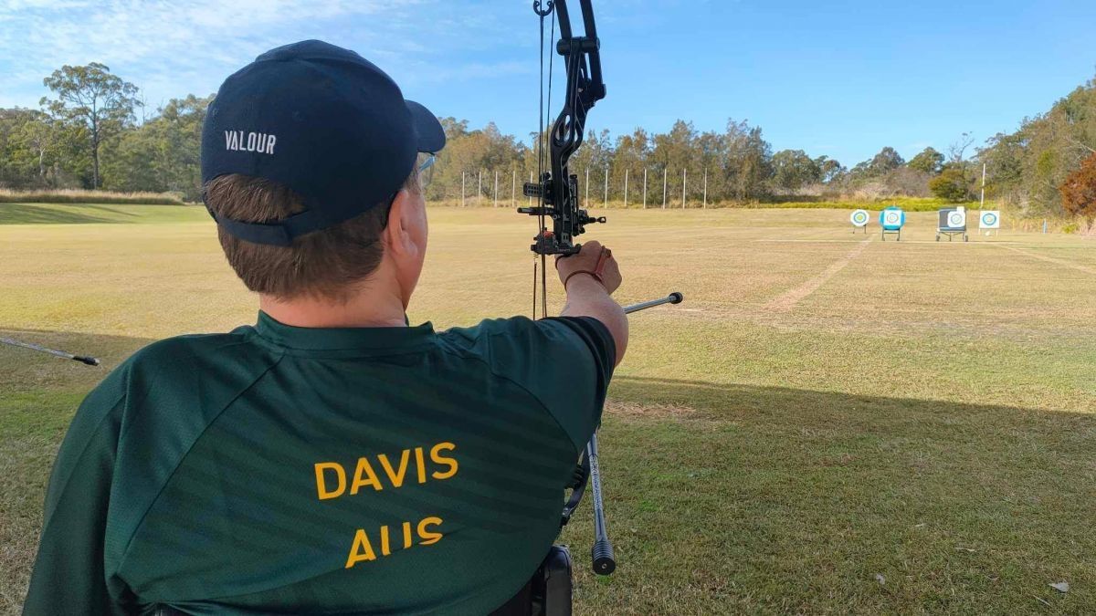 Chris Davis Para archery athlete in action