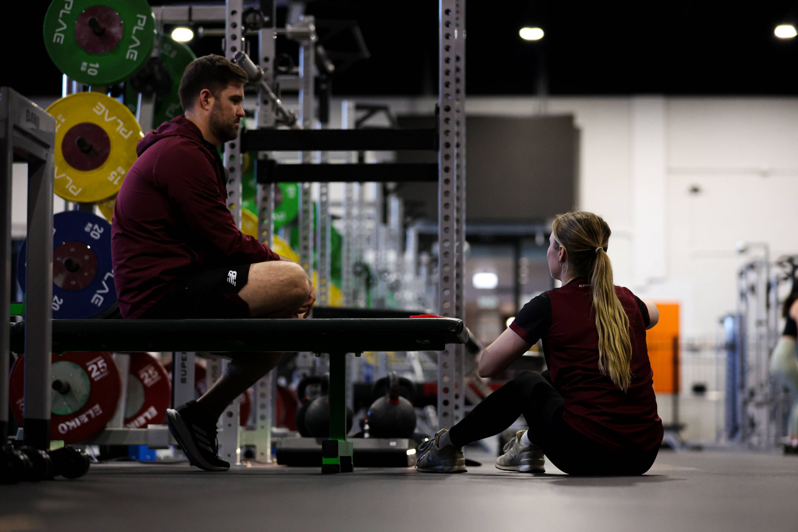 Strength & Conditioning Coach and Para athlete training in the gym
